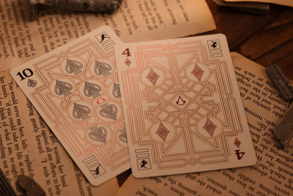 Room One Assassin's Creed Legacy Ver. II Playing Cards, Garnet Hidden Blade Edition, Poker Size Collectible Card Deck with Custom Artwork and Embossed Foil Sleeve, Red