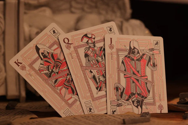 Room One Assassin's Creed Legacy Ver. II Playing Cards, Garnet Hidden Blade Edition, Poker Size Collectible Card Deck with Custom Artwork and Embossed Foil Sleeve, Red