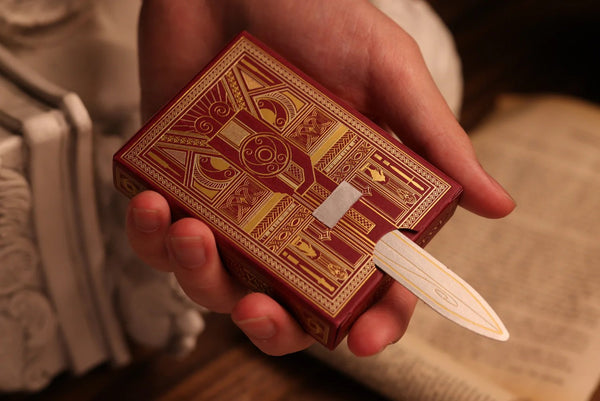 Room One Assassin's Creed Legacy Ver. II Playing Cards, Garnet Hidden Blade Edition, Poker Size Collectible Card Deck with Custom Artwork and Embossed Foil Sleeve, Red