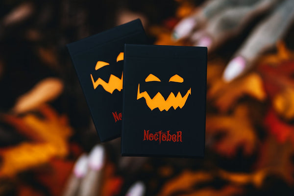 NOCtober Playing Cards - Halloween Neon Orange Deck that Glows Under Black Light - Cut-Out Jack-O’Lantern Tuck, Thin Crushed Finish, Poker Size Standard Index