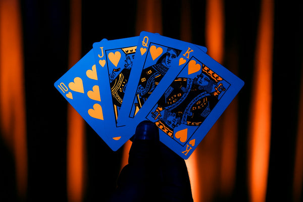 NOCtober Playing Cards - Halloween Neon Orange Deck that Glows Under Black Light - Cut-Out Jack-O’Lantern Tuck, Thin Crushed Finish, Poker Size Standard Index