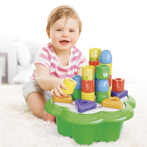 Quercetti Chunky Peggy 28-Piece Peg Blocks Stacking Toy – Jumbo Shape Sorting & Stacking Set for Babies & Toddlers 1+ with Built-in Daisy Basket Storage & 2 Rattles