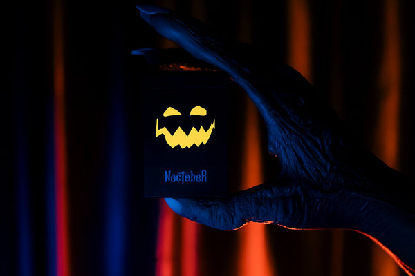 NOCtober Playing Cards - Halloween Neon Orange Deck that Glows Under Black Light - Cut-Out Jack-O’Lantern Tuck, Thin Crushed Finish, Poker Size Standard Index