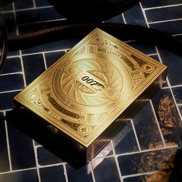 theory11 James Bond 007 Special Edition Box Set – Collector Playing Cards with 3 Gold Edition Decks + Solid Brass 007 Pen & Secret Hidden Compartment – Luxury Gift for 007 Fans & Card Enthusiasts